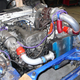 Illustration for article titled Eyesore Racings Ghettocharged Miata Fears No Turbocharged Peugeot Surrender Monkeys!